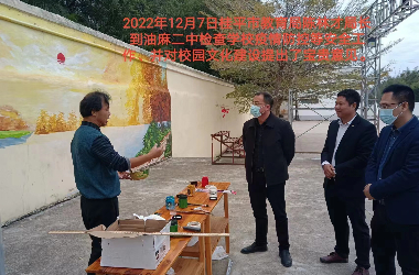  球友会体育美术教师到油麻二中绘制艺术墙活动